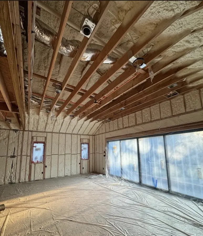 Interior walls and ceiling insulated with spray foam during new construction in Everett